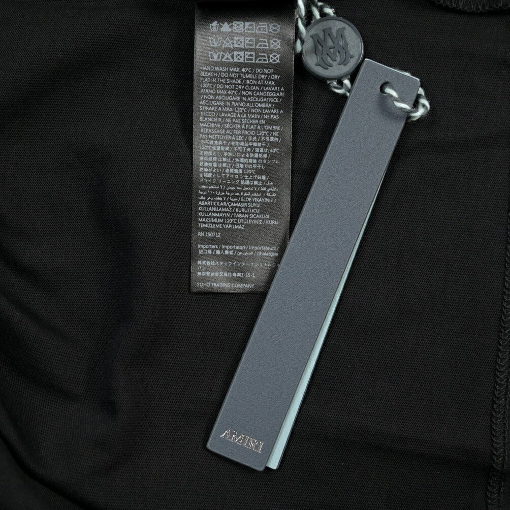 26 - 27AW AMIRI “BONES STACKED LONG SLEEVE TEE” コットン100% 長袖ロゴTシャツ ブラック S | GUARDAROBA MILANO OFFICIAL STORE